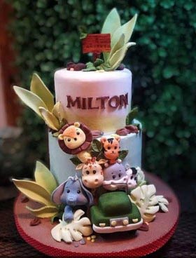 Torta artesanal con temática infantil animalitos de la selva, de dos pisos. Milton